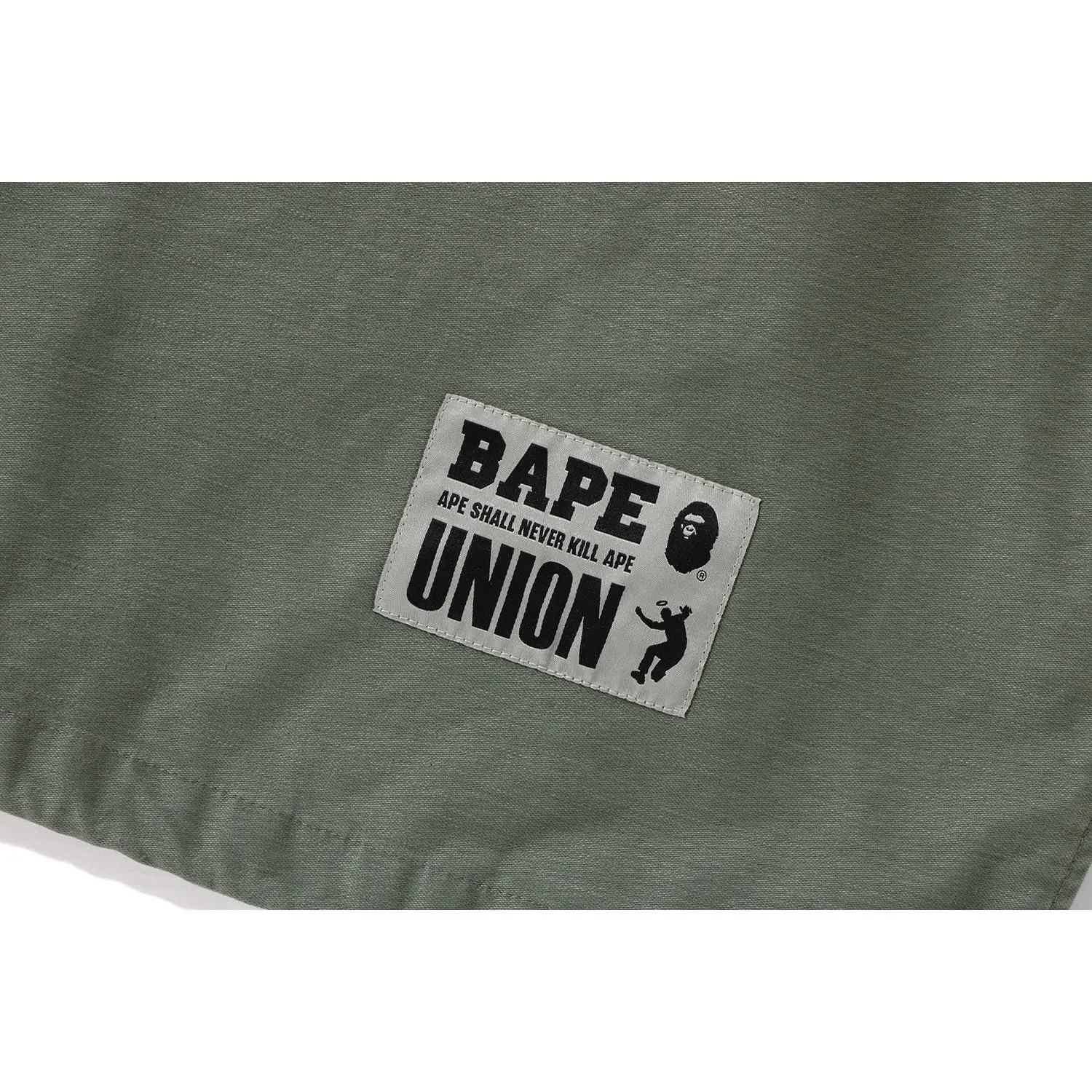 BAPE X UNION PIGMENT DYED COACH JACKET MENS