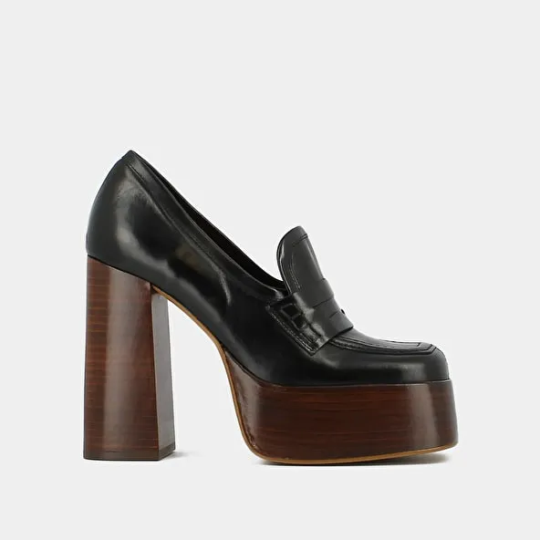 Platform loafers with square toe in black leather